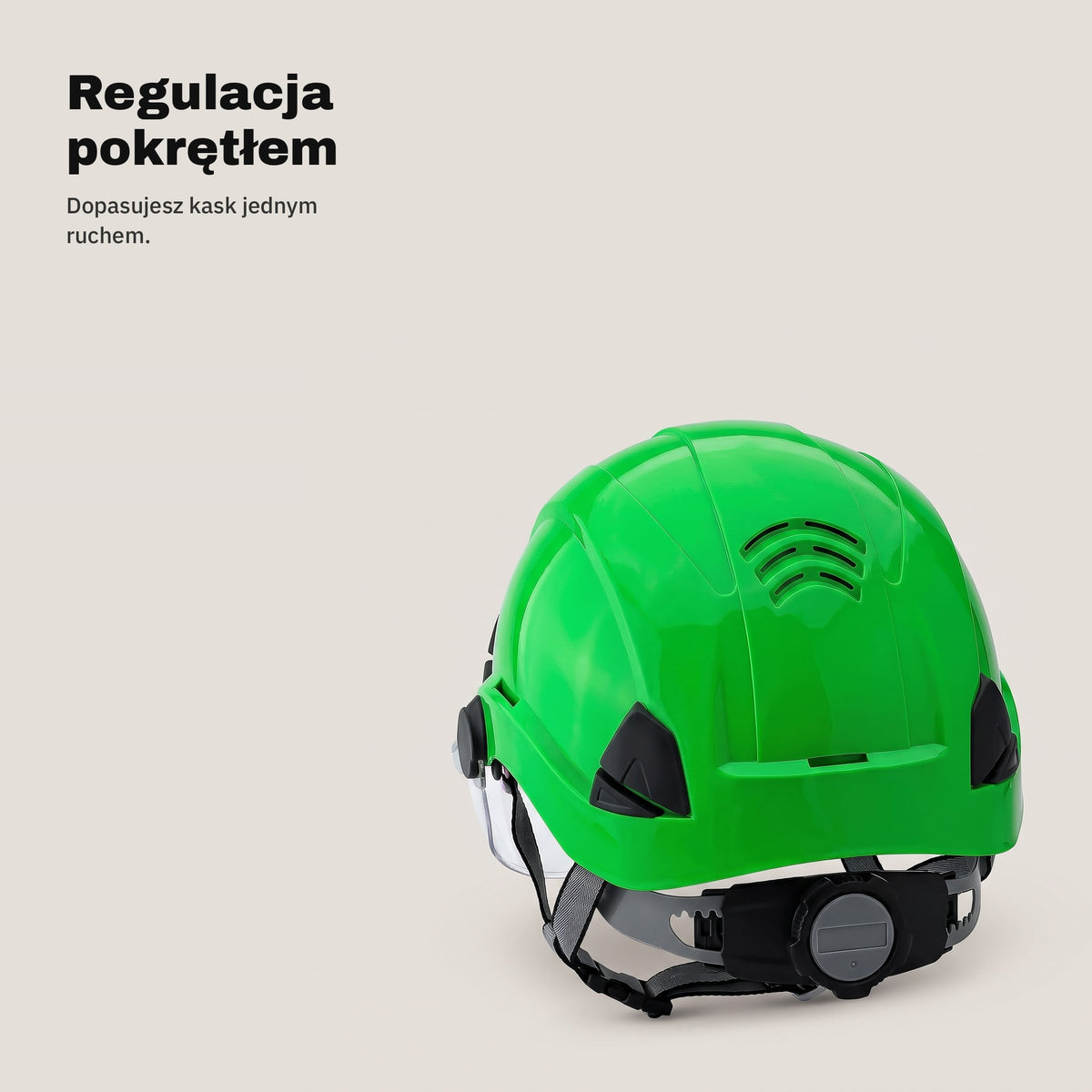 Pokrętło regulacji z tyłu zielonego kasku ochronnego