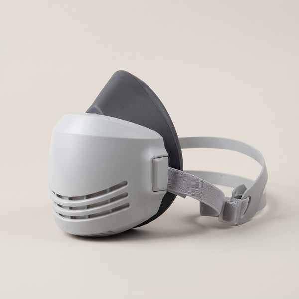 Reusable dust half mask — rubber face piece and hinged cover