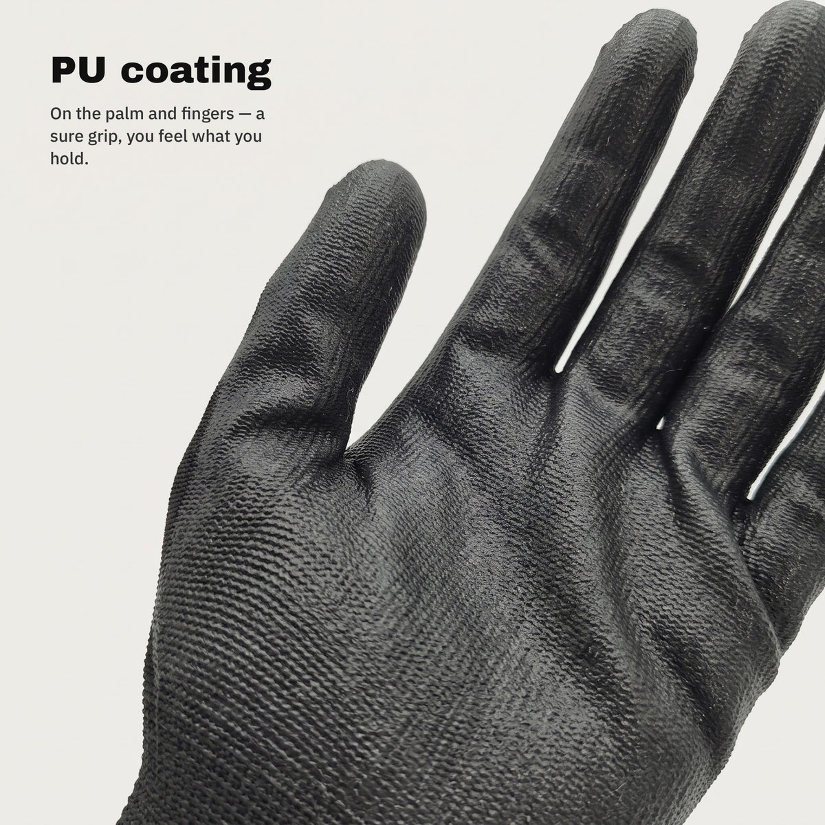 Close-up of the PU coating on the palm and fingers of the work gloves